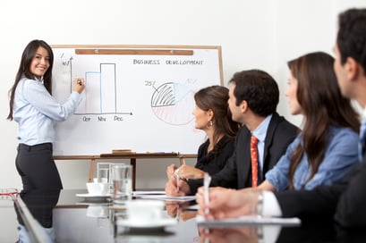 Woman-Giving-a-Presentation-with-Visuals.jpg