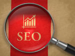 www.prismglobalmarketing.Comhubfsstock imagesSEO - Internet Concept Vergrootglas met SEO en groei grafiek pictogram op oud papier met rode verticale